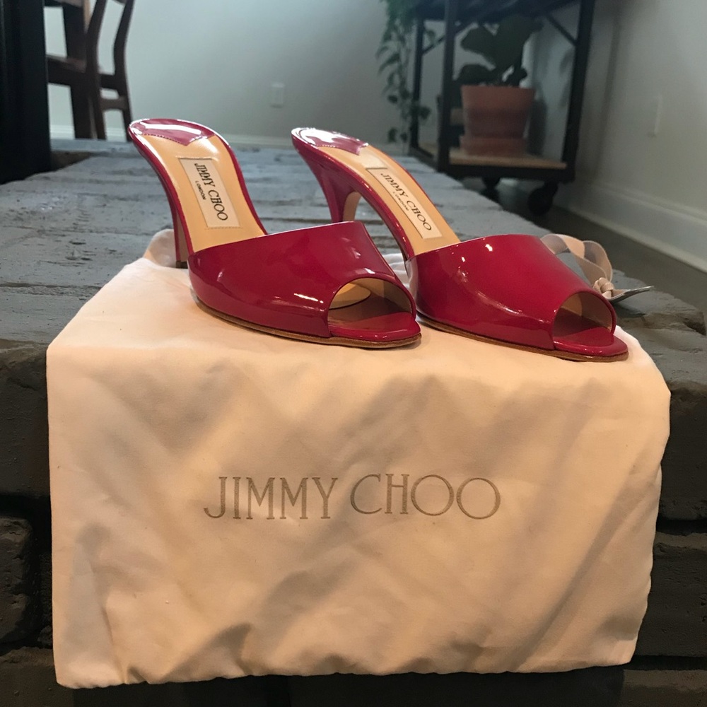 Never worn patent leather Jimmy Choo heel slides